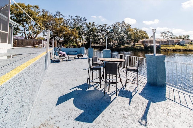 view of patio / terrace featuring a water view