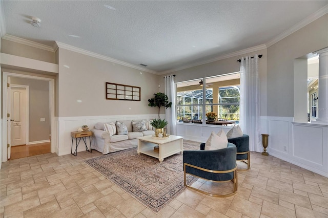 living room featuring crown molding and a textured ceiling