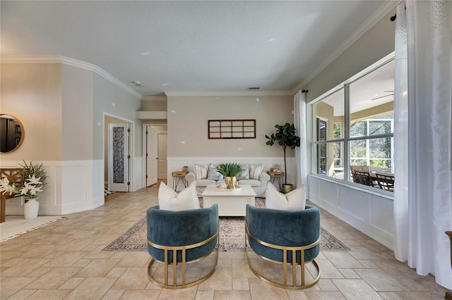 living room featuring crown molding and a textured ceiling