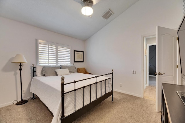 carpeted bedroom with ceiling fan and lofted ceiling