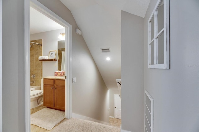 full bathroom with vanity, toilet, and shower / bath combo with shower curtain