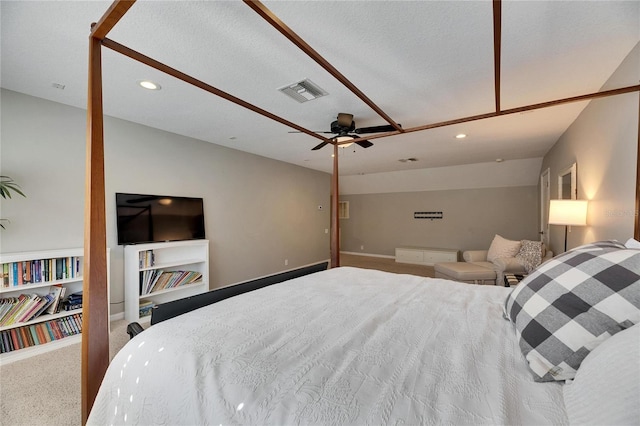 carpeted bedroom featuring a textured ceiling