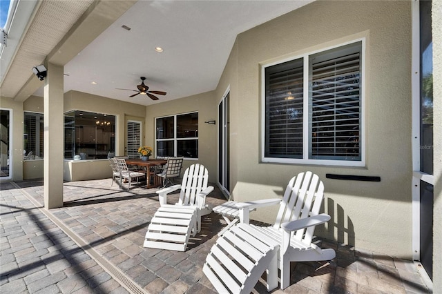 view of patio with ceiling fan