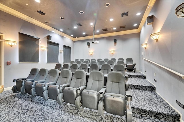 cinema with ornamental molding and carpet