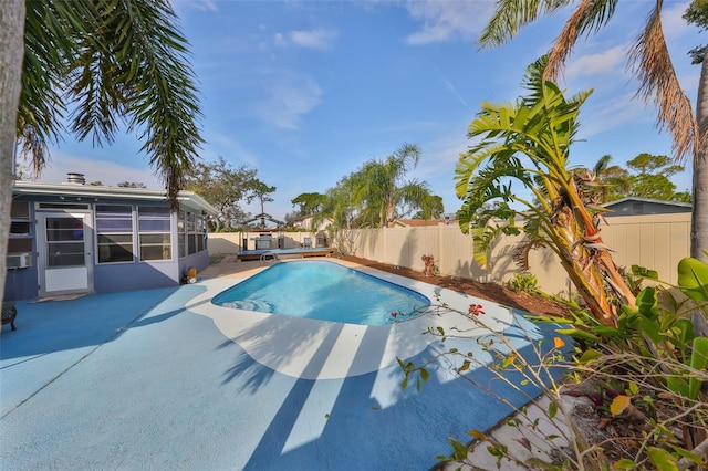 view of pool featuring a patio