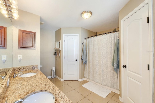 bathroom featuring vanity, tile patterned floors, and a shower with shower curtain