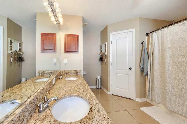 bathroom featuring tile patterned flooring, vanity, and a shower with shower curtain