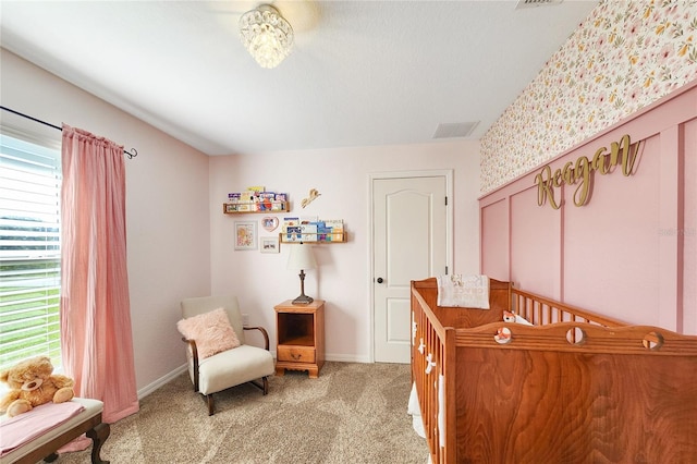 bedroom with light carpet