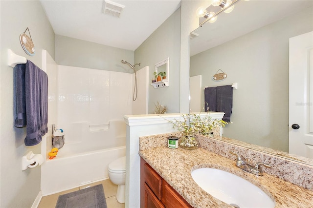 full bathroom featuring vanity, tile patterned flooring, toilet, and shower / bath combination