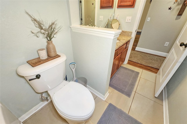 bathroom featuring tile patterned floors and toilet