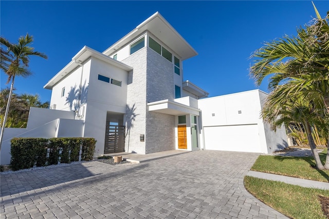 contemporary home featuring a garage