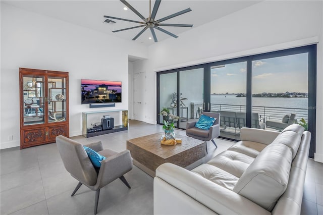 living room featuring a high ceiling