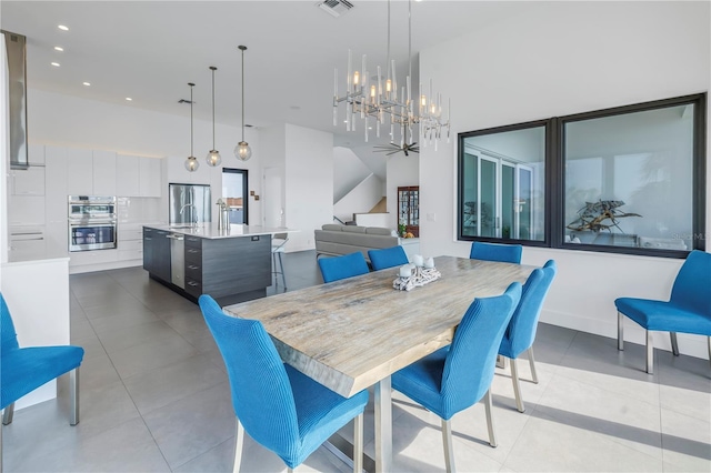 tiled dining room featuring a high ceiling