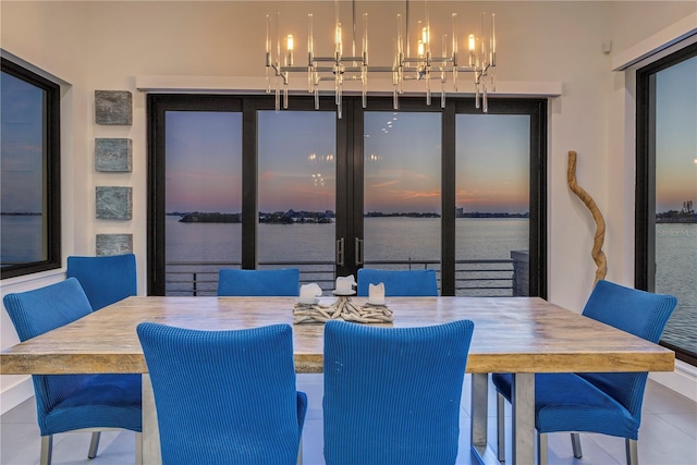 dining space with a water view