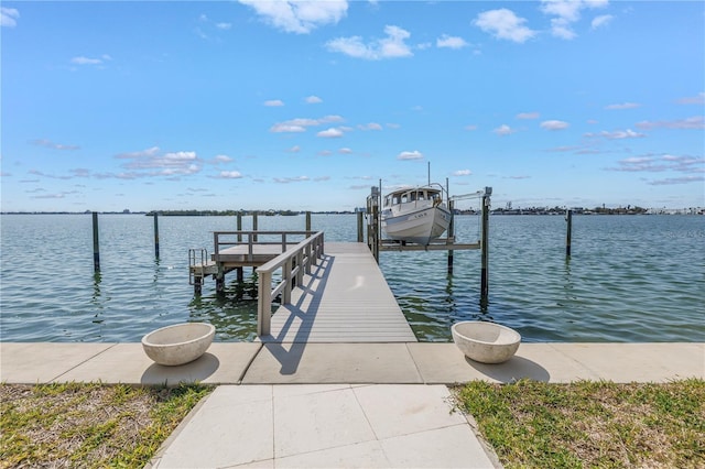 dock area with a water view