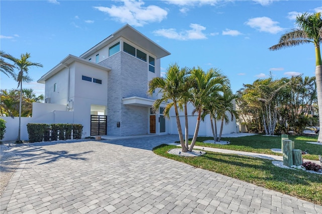 modern home with a front yard