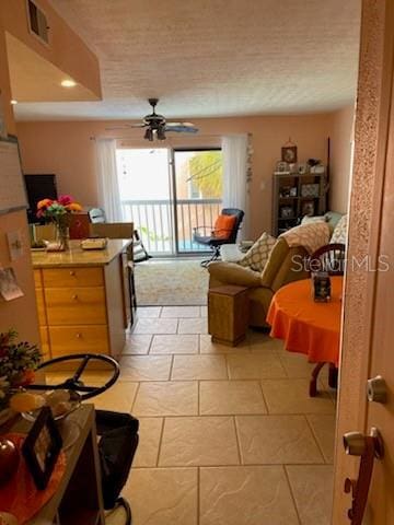 living room featuring ceiling fan