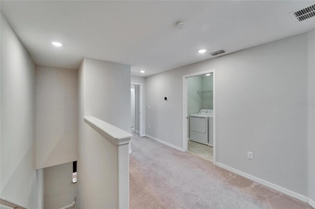 12973 Dream Catcher Way, Riverview, FL 33579 - corridor with independent washer and dryer and light carpet