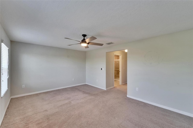12973 Dream Catcher Way, Riverview, FL 33579 - carpeted empty room with ceiling fan and a textured ceiling
