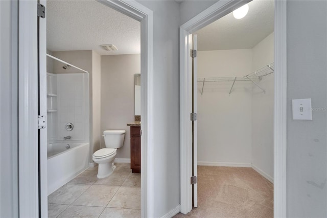 12973 Dream Catcher Way, Riverview, FL 33579 - full bathroom with vanity, tile patterned floors, a textured ceiling, and toilet