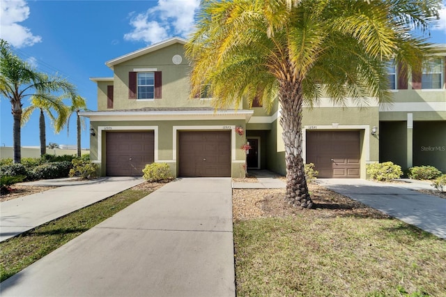 12973 Dream Catcher Way, Riverview, FL 33579 - view of front of property featuring a garage