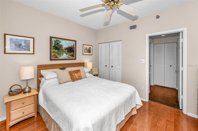 bedroom with a closet, ceiling fan, and light wood-type flooring