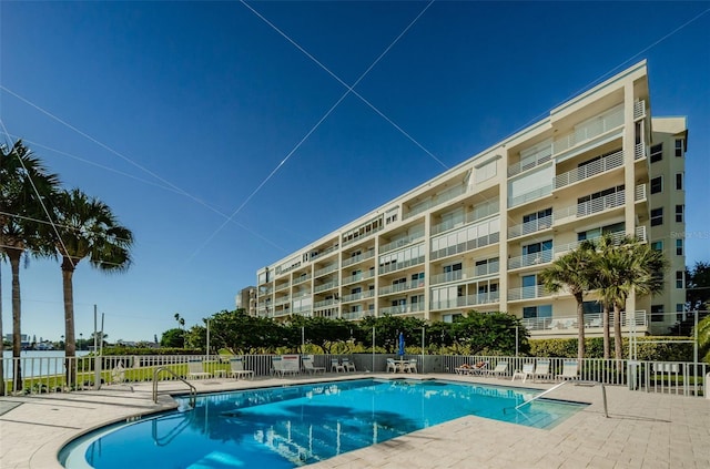 view of swimming pool featuring a patio