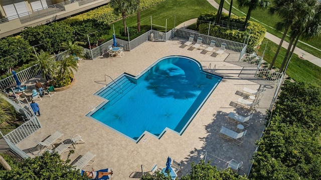 view of swimming pool featuring a patio