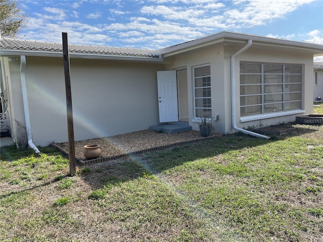 exterior space with a yard