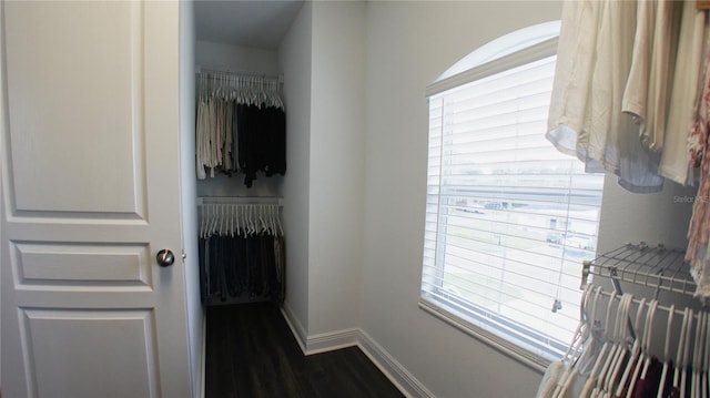 interior space with dark wood-type flooring