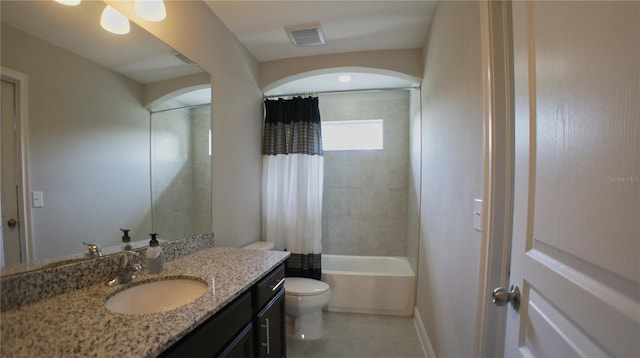 full bathroom featuring vanity, toilet, and shower / bath combo with shower curtain