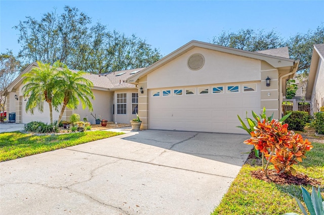 single story home with a garage