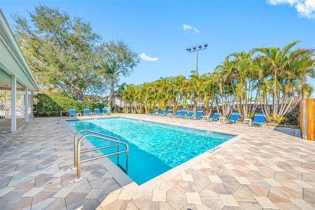 view of swimming pool with a patio area