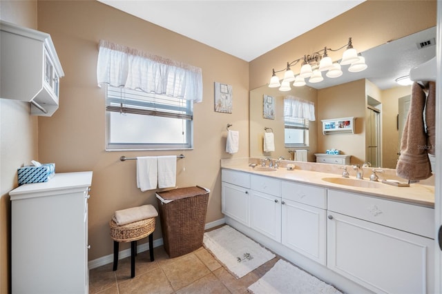 bathroom with vanity and tile patterned floors