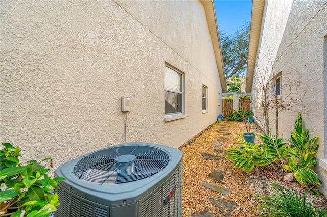 view of home's exterior with central AC