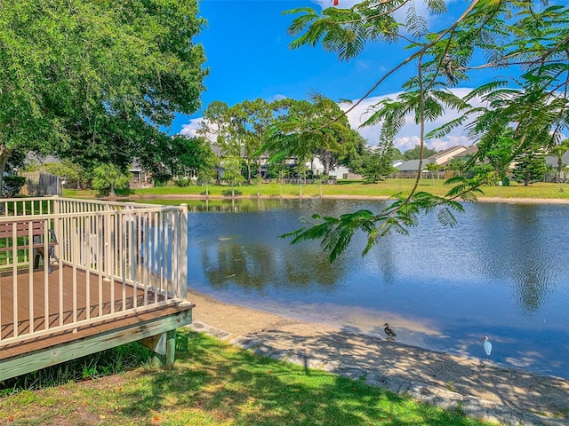 dock area with a deck with water view