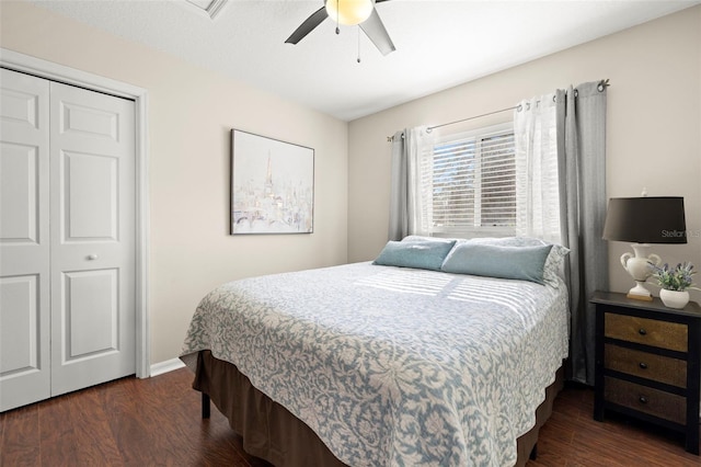 bedroom featuring dark hardwood / wood-style flooring, a closet, and ceiling fan