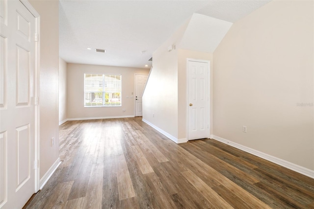 empty room with hardwood / wood-style flooring