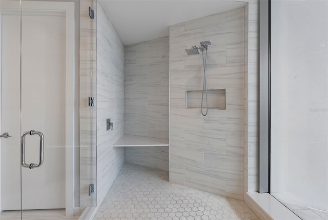 bathroom featuring tile patterned floors and walk in shower