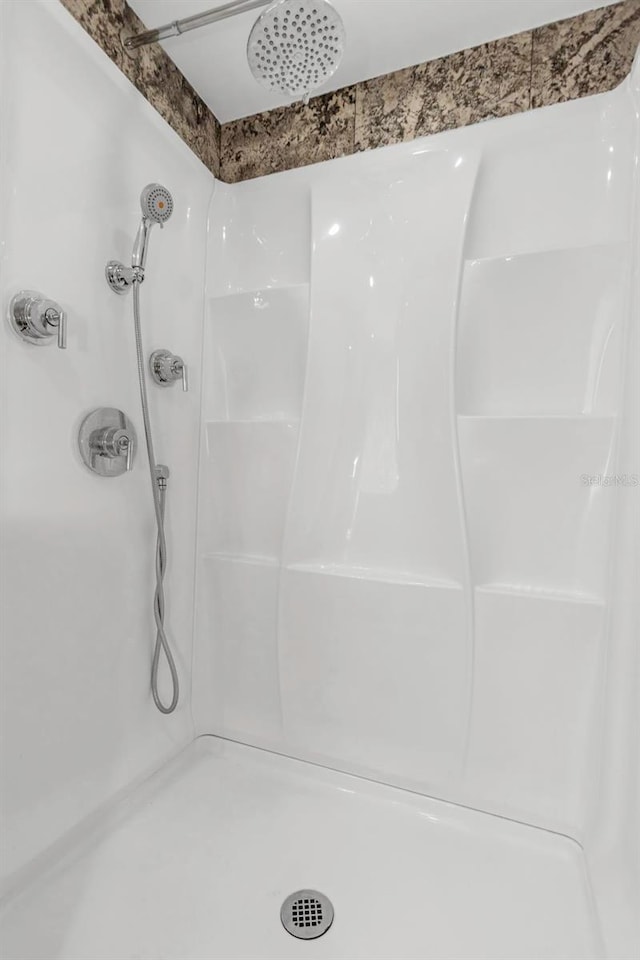 bathroom with a shower