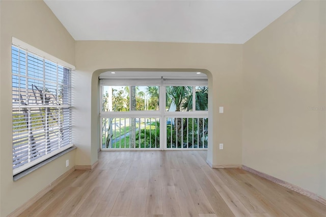 spare room featuring light hardwood / wood-style floors