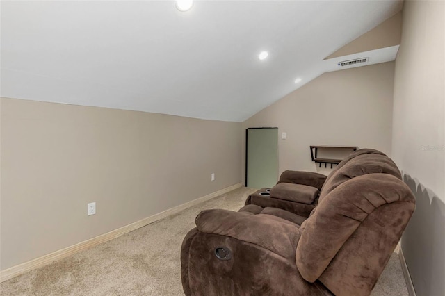 living room with lofted ceiling and light carpet