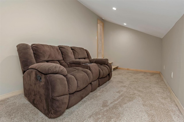 living room with light colored carpet and lofted ceiling