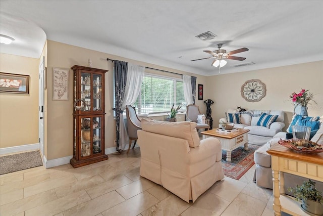 living room with ceiling fan