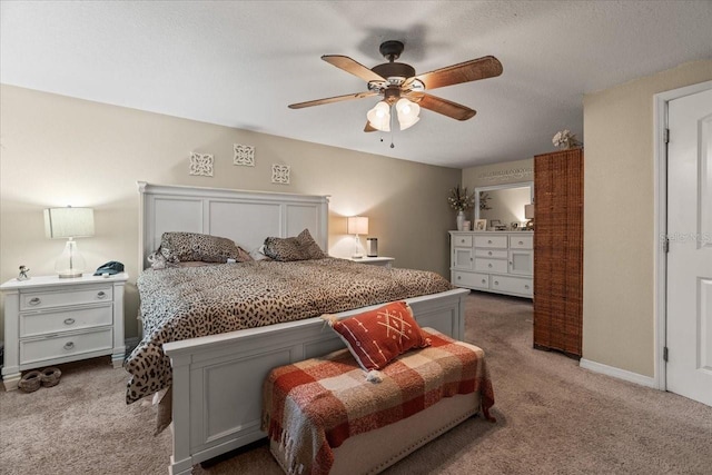 bedroom featuring ceiling fan and carpet floors