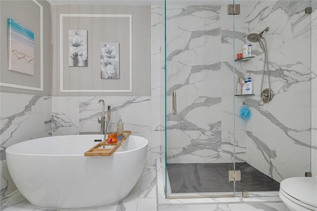 bathroom with toilet, marble finish floor, a marble finish shower, and a freestanding bath