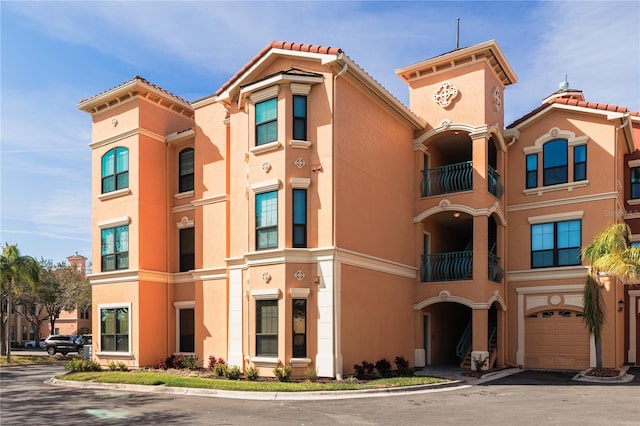 view of building exterior featuring a garage