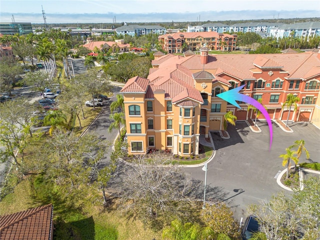 drone / aerial view with a residential view