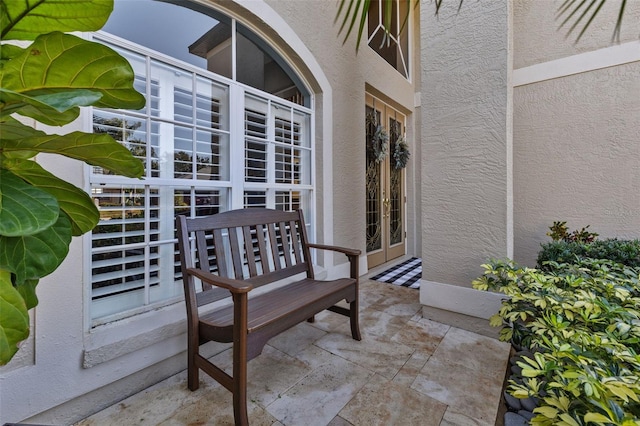 1881 Riveredge Dr, Tarpon Springs, FL 34689 - view of patio / terrace featuring french doors