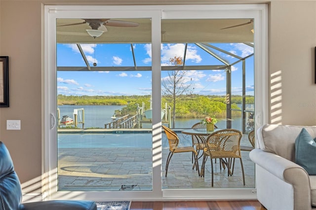 1881 Riveredge Dr, Tarpon Springs, FL 34689 - sunroom / solarium with a water view and a ceiling fan